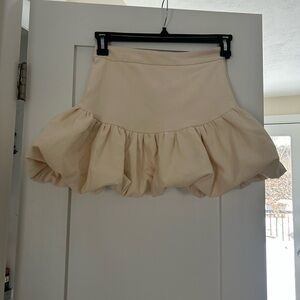 Cream Ruffled Women's Skirt. Exclusive brand sold at a speciality boutique.